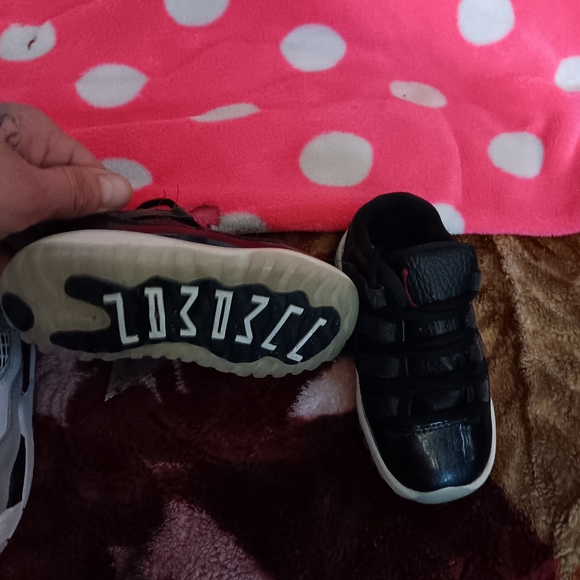 Baby /kid shoes made by Jordan size 7c all black Jordan Xl,4 \'s,nikes,air forces